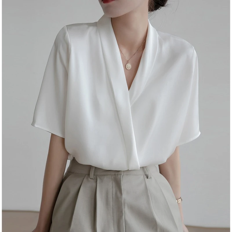 Summer Front Cross V-neck Satin Women's Blouses 2025 New Short Sleeve Elagant Korean Office Lady Casual Loose Shirts Female
Summer Front Cross V-neck Satin Women's Blouses 2025 New Short Sleeve Elagant Korean Office Lady Casual Loose Shirts Female