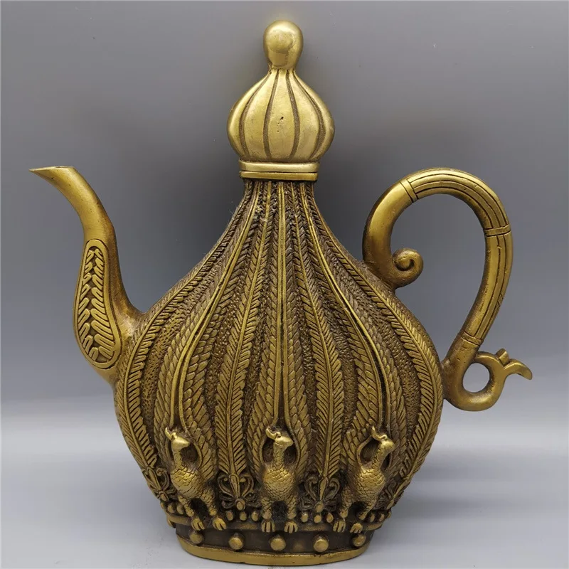 Copper ornament, brass teapot, wine pot, peacock tail , phoenix , flat kettle, home decoration
Copper ornament, brass teapot, wine pot, peacock tail , phoenix , flat kettle, home decoration