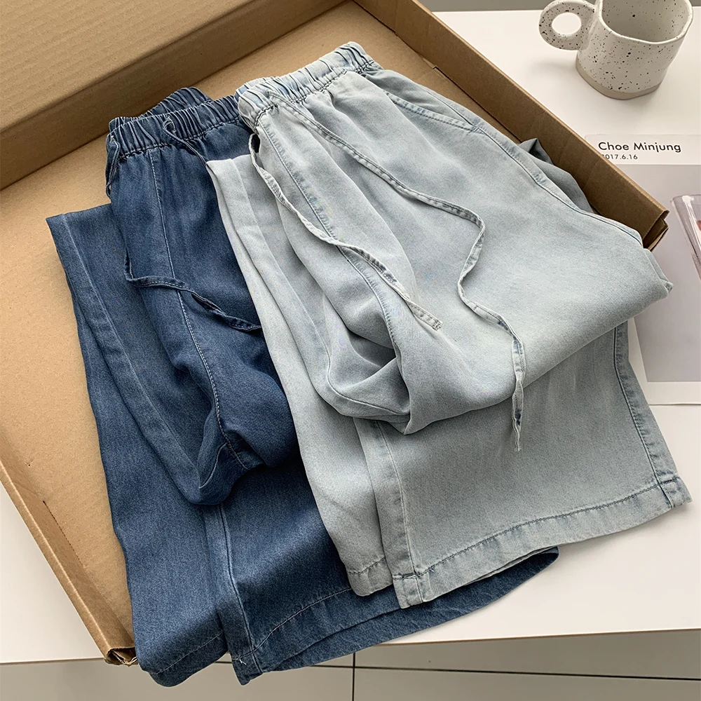 Summer Thin Ice Silk Denim Pants for Women 2025 Washed Blue Elastic Waist Drawstring Jeans Casual Straight Loose Wide Leg Pants
Summer Thin Ice Silk Denim Pants for Women 2025 Washed Blue Elastic Waist Drawstring Jeans Casual Straight Loose Wide Leg Pants
