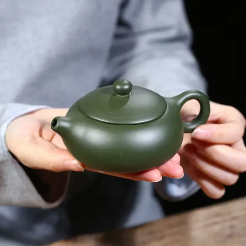 1PCS 180ML Yixing raw ore green mud xishi teapot Chinese style filter purple clay tea pot customized zisha tea set gift
1PCS 180ML Yixing raw ore green mud xishi teapot Chinese style filter purple clay tea pot customized zisha tea set gift