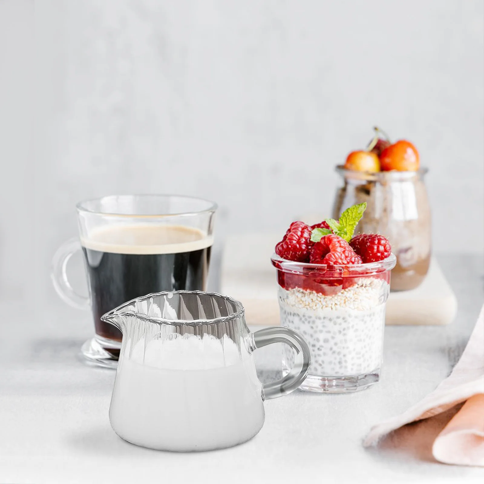 Glass Creamer Pitcher 150Ml Small Milk Jug Sturdy Glass Milk Frothing Pitcher Comfortable Handle Coffee Creamer Dispenser
Glass Creamer Pitcher 150Ml Small Milk Jug Sturdy Glass Milk Frothing Pitcher Comfortable Handle Coffee Creamer Dispenser