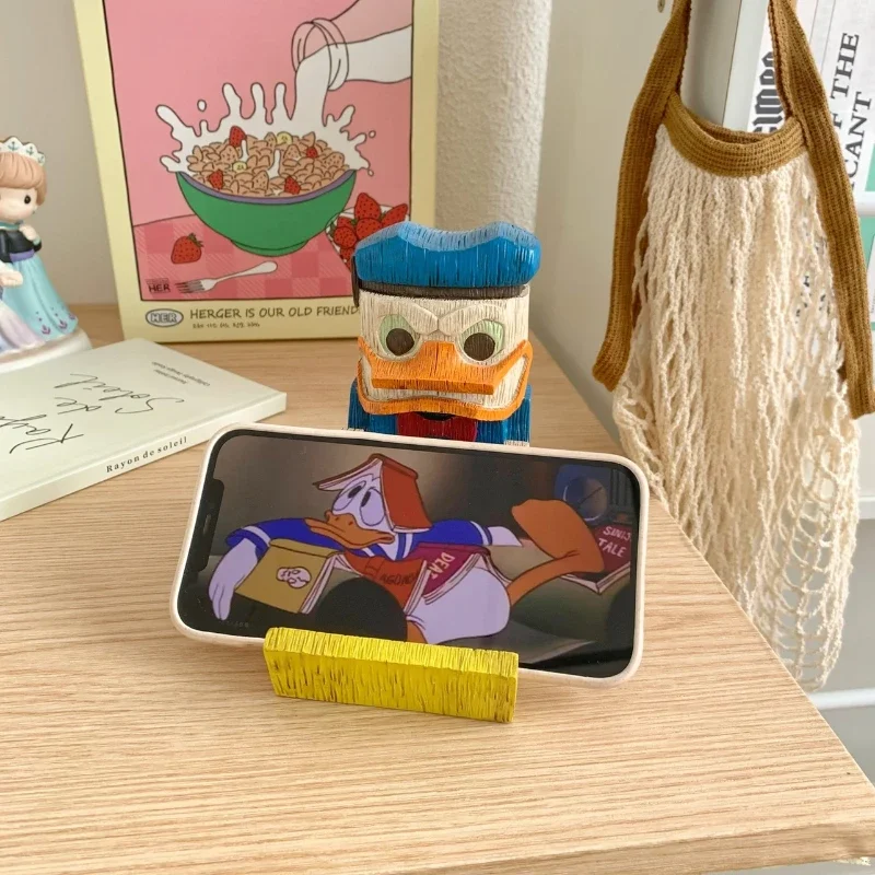 Disney Anger Donald Duck Cartoon Figure Antique Resin Phone Holder Horizontal Vertical Placement Desktop Ornaments Birthday Gift
Disney Anger Donald Duck Cartoon Figure Antique Resin Phone Holder Horizontal Vertical Placement Desktop Ornaments Birthday Gift