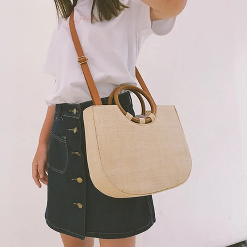 Fashionable Temperament One-shoulder Cross-body Women's Korean Version Of Simple Large-capacity Round Wooden Handle Grass
Fashionable Temperament One-shoulder Cross-body Women's Korean Version Of Simple Large-capacity Round Wooden Handle Grass