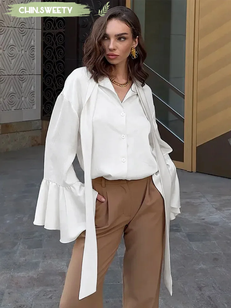 Solid Lotus Leaf Sleeve Tied Shirt Women Elegant Long Sleeved Lapel Single Breasted Top 2025 Summer Fashion Commuter Lady Wear
Solid Lotus Leaf Sleeve Tied Shirt Women Elegant Long Sleeved Lapel Single Breasted Top 2025 Summer Fashion Commuter Lady Wear