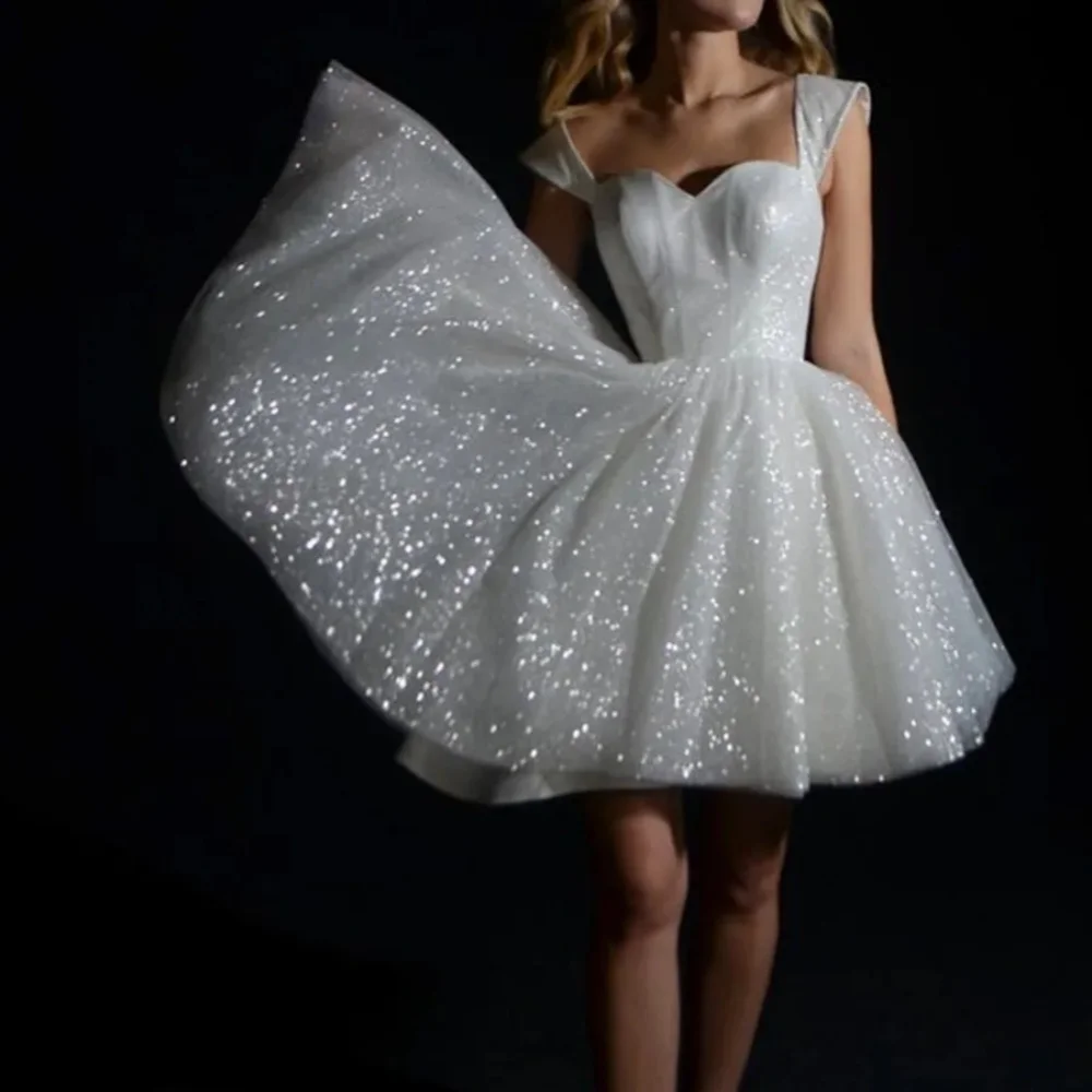 2024 Glitter Short A Line Wedding Dresses Spaghetti Strap Pearl Top Backless Sexy Sequin Bridal Bridal Party Dresses Beach Gown
2024 Glitter Short A Line Wedding Dresses Spaghetti Strap Pearl Top Backless Sexy Sequin Bridal Bridal Party Dresses Beach Gown