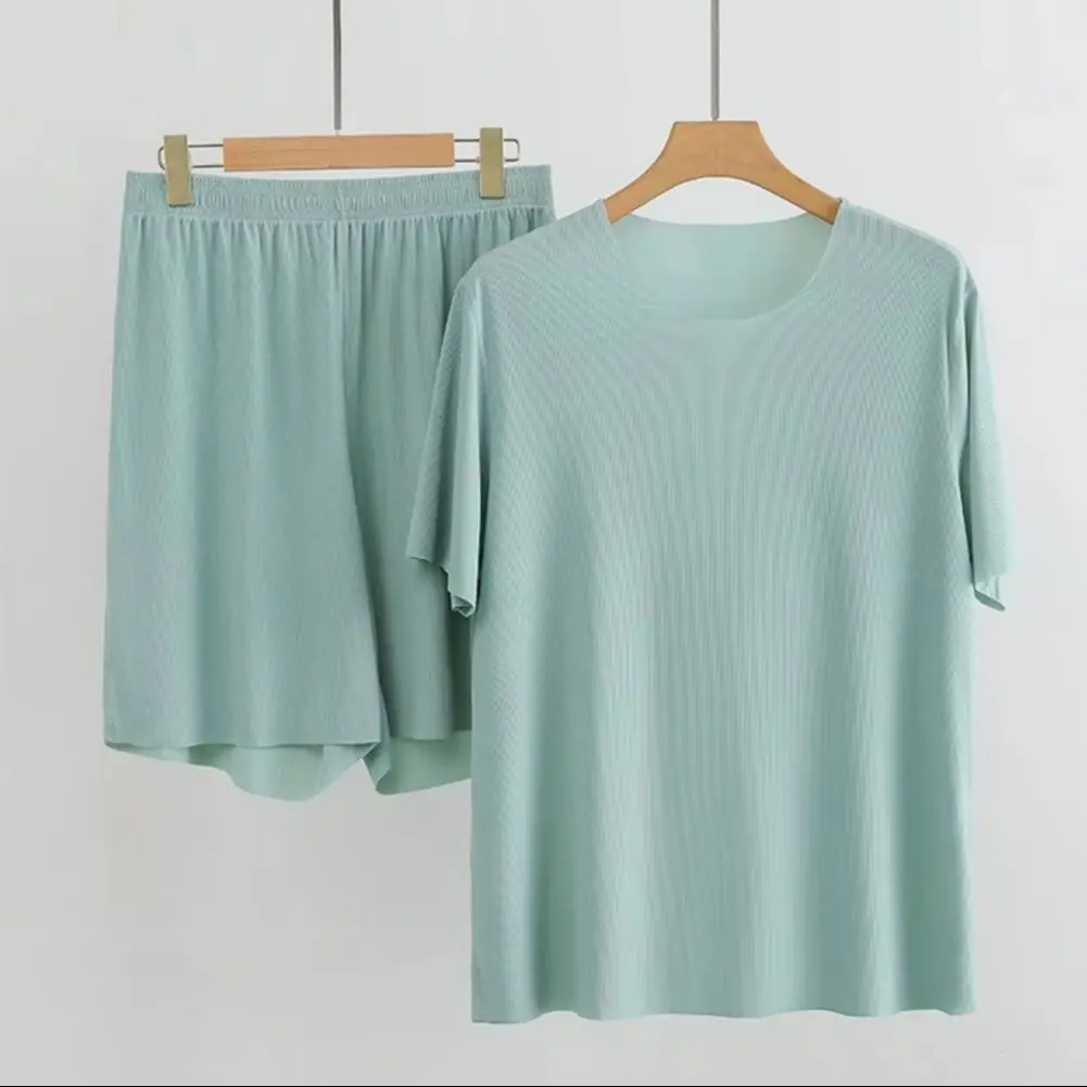 Ice Silk Men Pajama Two-piece Loungewear O-Neck Short Sleeve T-shirt Elastic Waist Wide Leg Shorts Set Homewear Sleepwear Pajama
Ice Silk Men Pajama Two-piece Loungewear O-Neck Short Sleeve T-shirt Elastic Waist Wide Leg Shorts Set Homewear Sleepwear Pajama