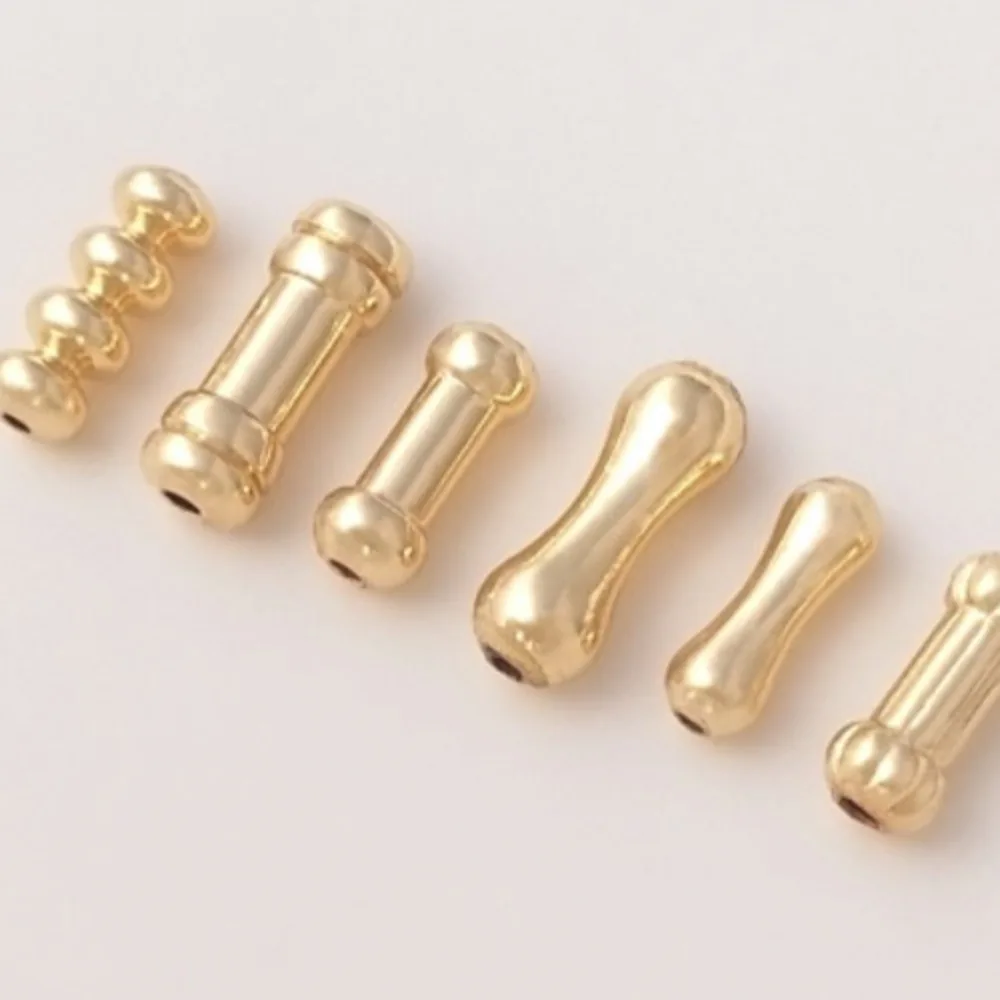 Медные бусины 14-каратного золота, прямые трубчатые бусины, маленькая талия, бамбуковая тыква, кость через отверстие, трубчатые бусины, аксессуары для браслетов «сделай сам»
Медные бусины 14-каратного золота, прямые трубчатые бусины, маленькая талия, бамбуковая тыква, кость через отверстие, трубчатые бусины, аксессуары для браслетов «сделай сам»