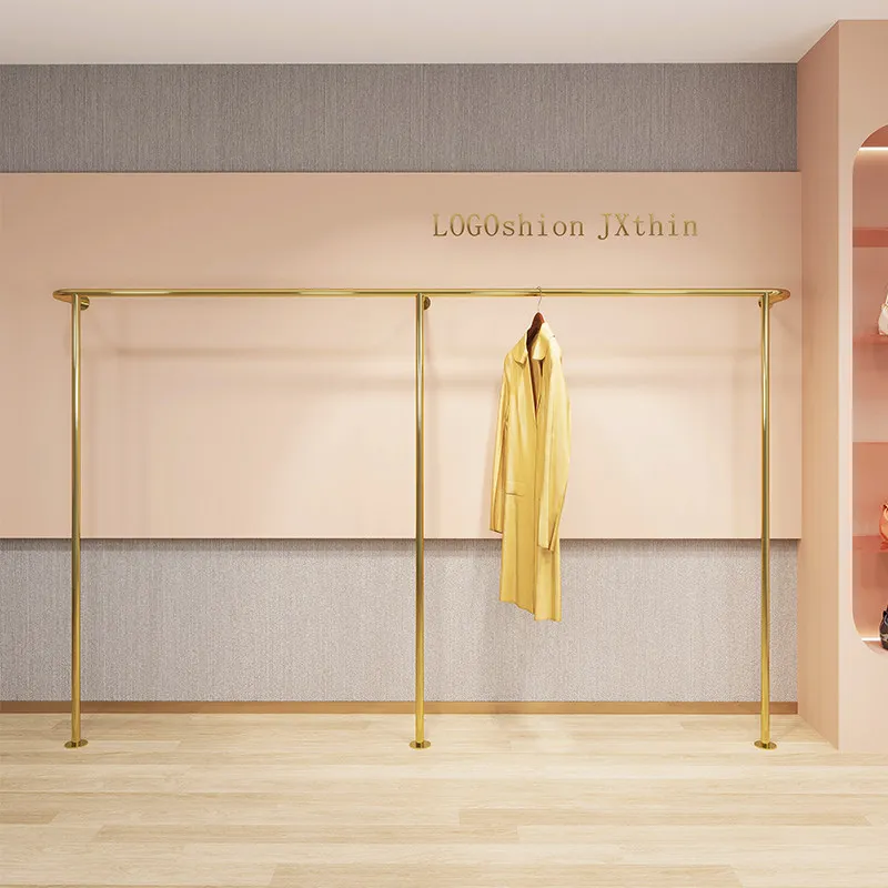 Wall-mounted floor-to-ceiling stainless steel titanium hanging clothes rack on the clothing store display shelf women's
Wall-mounted floor-to-ceiling stainless steel titanium hanging clothes rack on the clothing store display shelf women's