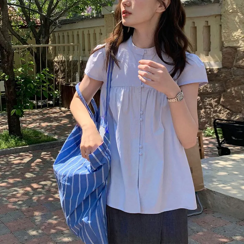 College Style Korean Stand Collar Shirts Summer Short Sleeve Female Clothing New Loose Design Fashion Blue Solid Color Blouse
College Style Korean Stand Collar Shirts Summer Short Sleeve Female Clothing New Loose Design Fashion Blue Solid Color Blouse