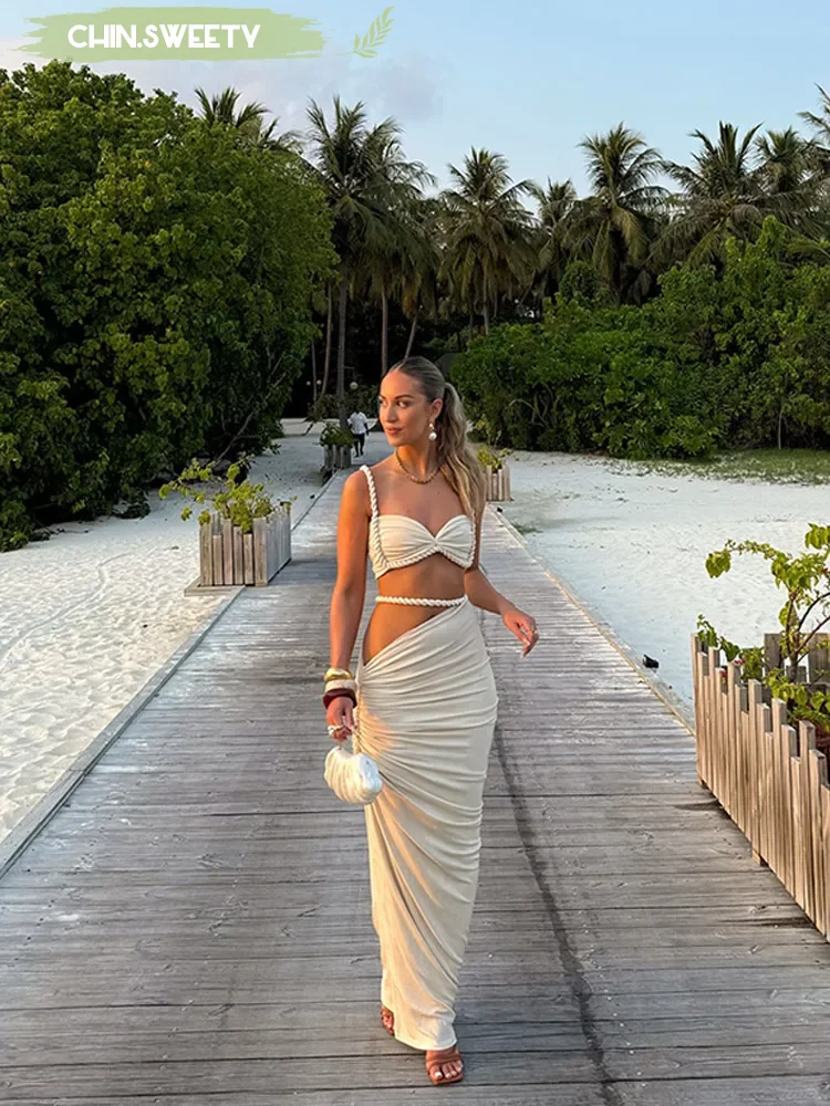 Solid Pleated Strap Maxi Skirt Suit Women Sexy Bodycon Sleeveless Backless Asymmetrical Two Piece Set 2025 Summer Elegant Outfit
Solid Pleated Strap Maxi Skirt Suit Women Sexy Bodycon Sleeveless Backless Asymmetrical Two Piece Set 2025 Summer Elegant Outfit