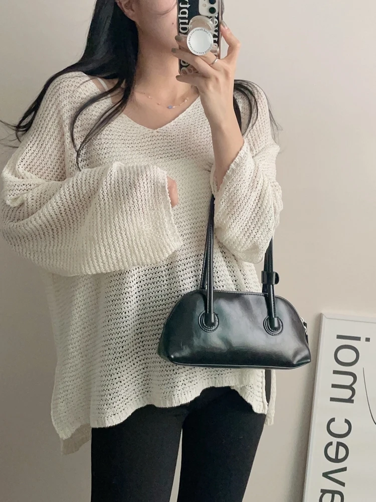 Loose V-Neck Ice Silk Knitted Top Mid-Length Open-Hem Casual Style Women's Fashion Korean Style Breathable Pure Color
Loose V-Neck Ice Silk Knitted Top Mid-Length Open-Hem Casual Style Women's Fashion Korean Style Breathable Pure Color