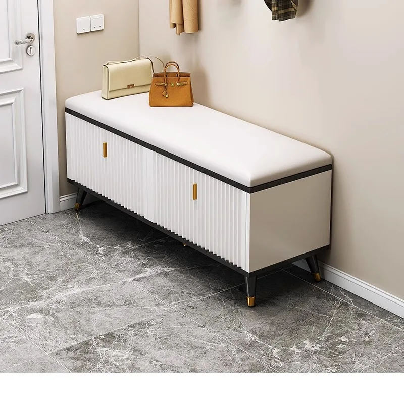 A simple shoe changing stool at the entrance of a household shoe cabinet, used for storing shoes when entering the door
A simple shoe changing stool at the entrance of a household shoe cabinet, used for storing shoes when entering the door
