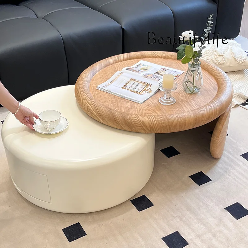 Cream wind retractable coffee table designer living room household size round combination high sense
Cream wind retractable coffee table designer living room household size round combination high sense
