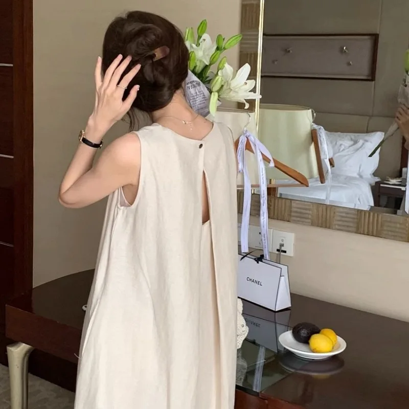 2026 New Summer Women's Sleeveless Dress Elegant Solid Color Hollow Out Backless Simple Crew Neck Mid Length Daily Vest Dress
2026 New Summer Women's Sleeveless Dress Elegant Solid Color Hollow Out Backless Simple Crew Neck Mid Length Daily Vest Dress