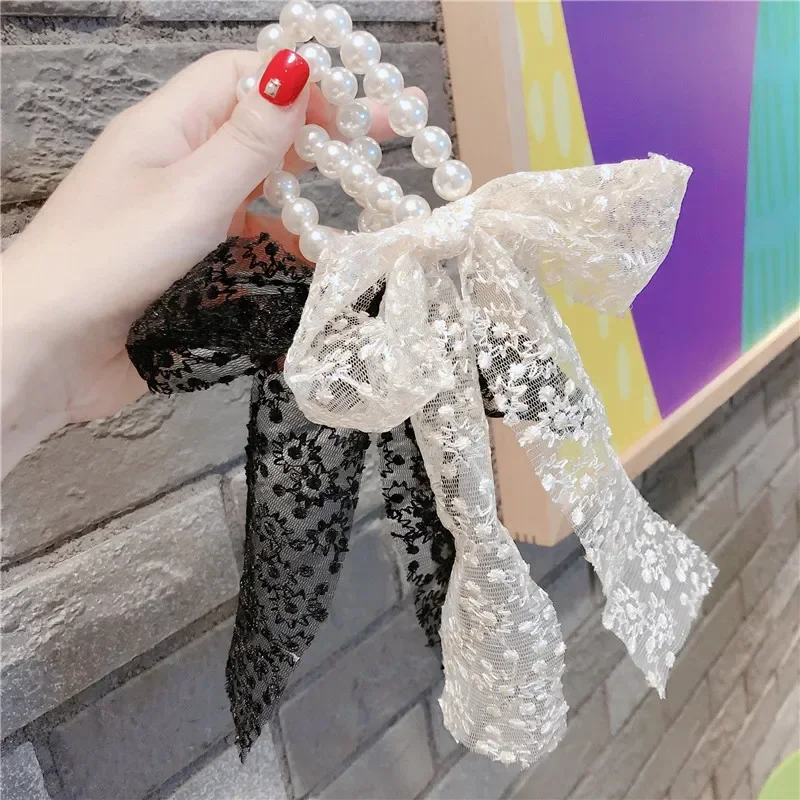 Spring and Summer Models of Small Fragrance Pearl Lace Bow Temperament Ribbon Hair Ring Hair Accessories
Spring and Summer Models of Small Fragrance Pearl Lace Bow Temperament Ribbon Hair Ring Hair Accessories