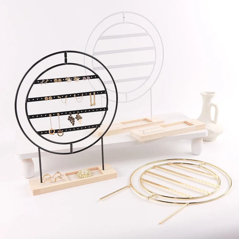 Rotating Round Metal Earring Display Stand, Jewelry Organizer with Wooden Base for Retail Shop and Home Vanity
Rotating Round Metal Earring Display Stand, Jewelry Organizer with Wooden Base for Retail Shop and Home Vanity