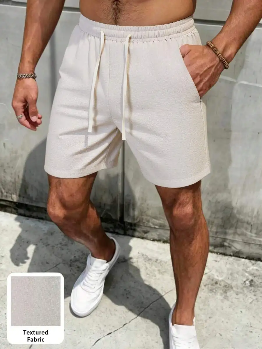 Mens Solid Color Loose Casual Shorts With Pockets Drawstring Waist Textured Fabric
Mens Solid Color Loose Casual Shorts With Pockets Drawstring Waist Textured Fabric
