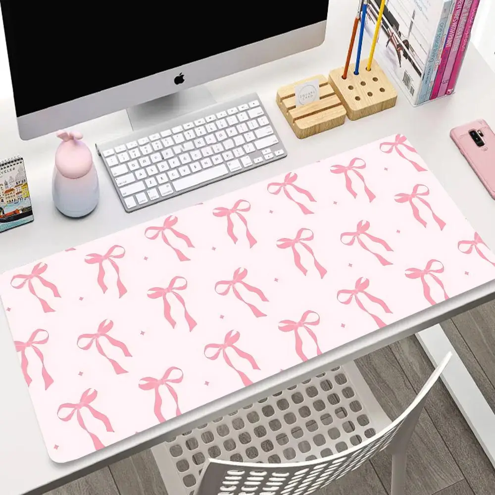 Pink bow pattern mouse pad, high-quality rubber anti-slip washable PC accessory, suitable for gamers and families 
Pink bow pattern mouse pad, high-quality rubber anti-slip washable PC accessory, suitable for gamers and families