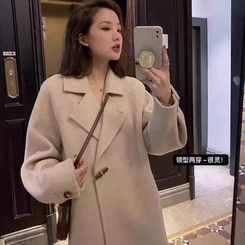Double-sided wool coat long lantern sleeve stand-up collar horn buckle plush thickened warm wool double-sided coat women
Double-sided wool coat long lantern sleeve stand-up collar horn buckle plush thickened warm wool double-sided coat women