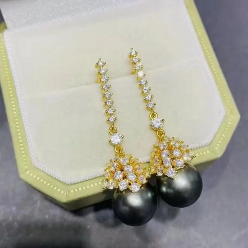 stunning 10-11mm tahitian round black green pearl dangle earring 925s
stunning 10-11mm tahitian round black green pearl dangle earring 925s