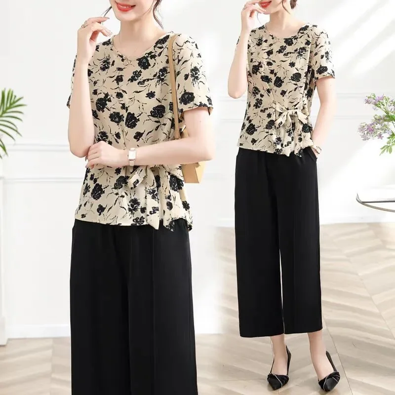 Korean Femme Round Neck Two-piece Set Summer Lady Fashion Printing Wide Leg Pants 2PCS 2025 Women Short Sleeve Pantalons Outfit
Korean Femme Round Neck Two-piece Set Summer Lady Fashion Printing Wide Leg Pants 2PCS 2025 Women Short Sleeve Pantalons Outfit