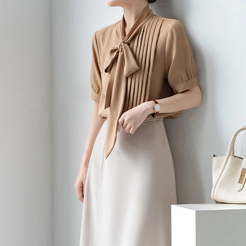 Solid Color Short Sleeved Bow Lantern Sleeve With Ribbon Collar Tie Khaki Chiffon Shirt Versatile New Loose Temperament Top
Solid Color Short Sleeved Bow Lantern Sleeve With Ribbon Collar Tie Khaki Chiffon Shirt Versatile New Loose Temperament Top
