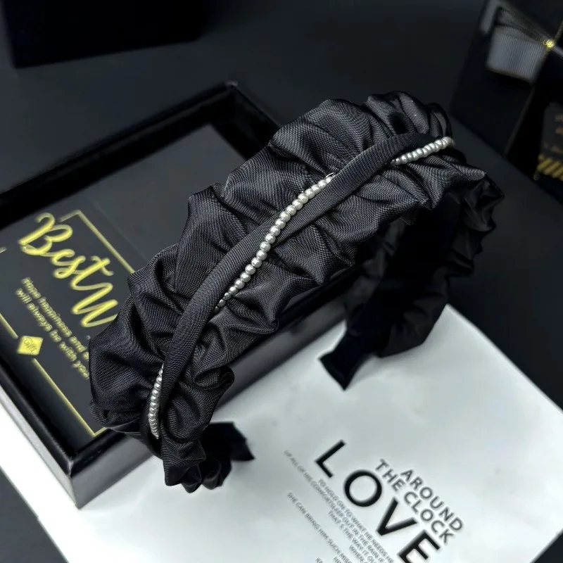 Black pleated satin pearl headband women's new wide-edged non-slip versatile pressure hair headband advanced sense hairpin
Black pleated satin pearl headband women's new wide-edged non-slip versatile pressure hair headband advanced sense hairpin