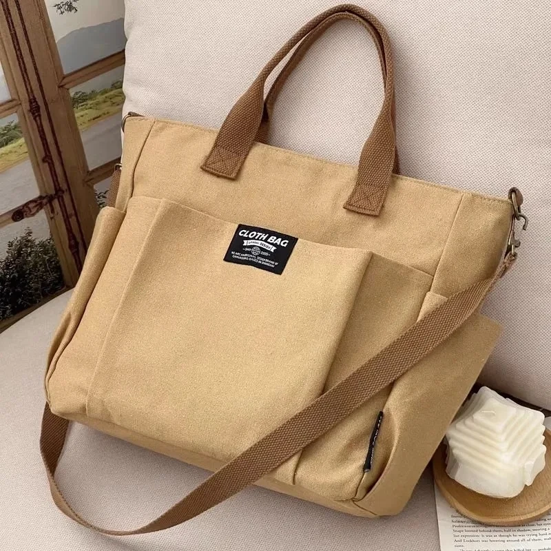 Urban Minimalist Female Student Large Capacity Commuting Horizontal Canvas Single Shoulder Diagonal Cross Portable Tote Bag
Urban Minimalist Female Student Large Capacity Commuting Horizontal Canvas Single Shoulder Diagonal Cross Portable Tote Bag