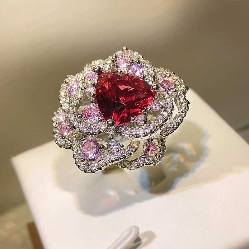 High carbon diamond high-tech diamond color ice flower cut open and closed ring live source high quality gift crystal
High carbon diamond high-tech diamond color ice flower cut open and closed ring live source high quality gift crystal