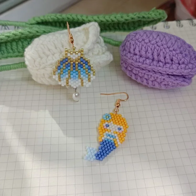 ZGMXR Rice bead earrings Triangle Crystal Sea shell Mermaid Design Hand knitting Bohemia Alloy Fashion Beaded earrings
ZGMXR Rice bead earrings Triangle Crystal Sea shell Mermaid Design Hand knitting Bohemia Alloy Fashion Beaded earrings