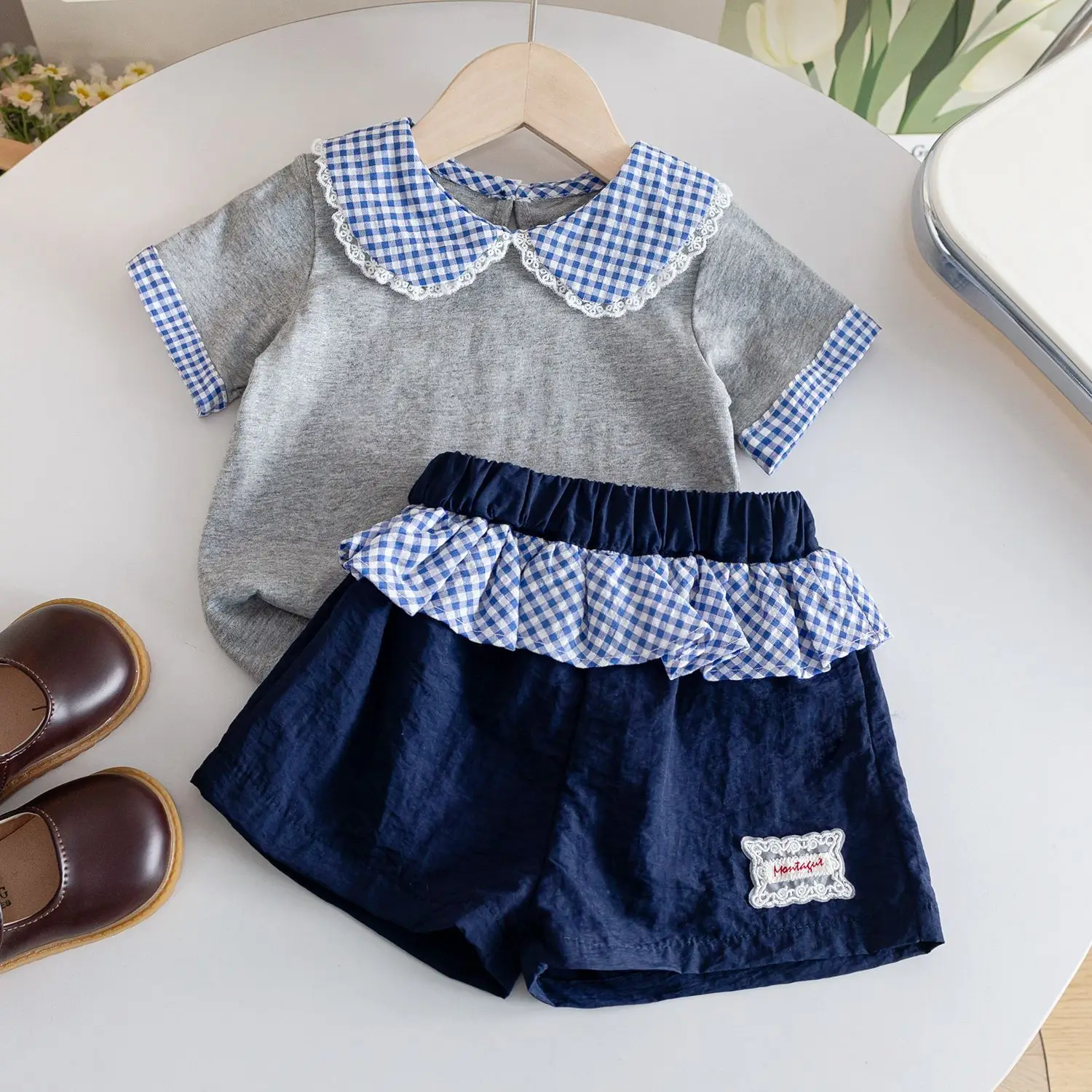 Girls 2025 Summer College Style Flip Collar Short Sleeve Top Checkered Lace Shorts Set
Girls 2025 Summer College Style Flip Collar Short Sleeve Top Checkered Lace Shorts Set