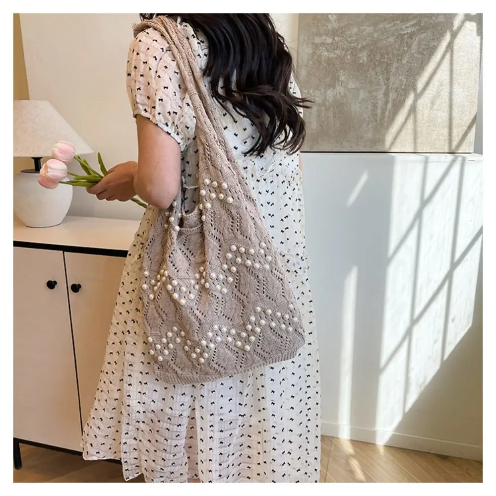 Hollow Out Women Knitting Shoulder Bag Beaded Decoration Portable Casual Crochet Bag Spacious Soft Shopping Handbags
Hollow Out Women Knitting Shoulder Bag Beaded Decoration Portable Casual Crochet Bag Spacious Soft Shopping Handbags