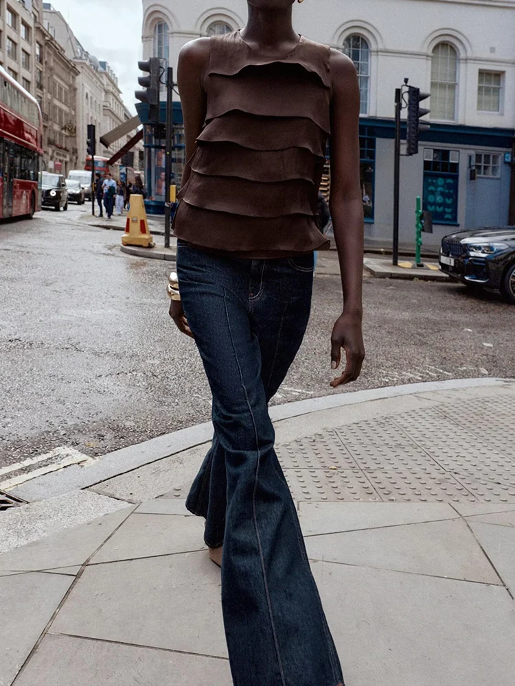 Новое осеннее поступление в европейском и американском стиле, женский минималистичный атласный топ без рукавов с круглым вырезом и рюшами
Новое осеннее поступление в европейском и американском стиле, женский минималистичный атласный топ без рукавов с круглым вырезом и рюшами