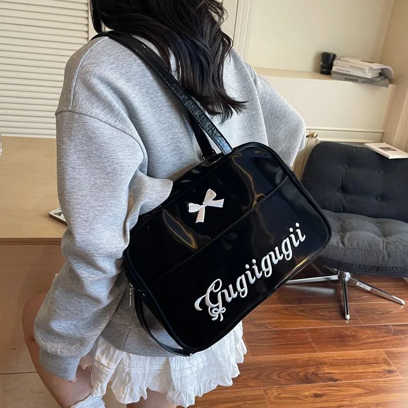 Bow Letter Fashion Backpack Bag Women's 2025 Versatile Niche Simple High-end Shoulder Messenger Bag 
Bow Letter Fashion Backpack Bag Women's 2025 Versatile Niche Simple High-end Shoulder Messenger Bag