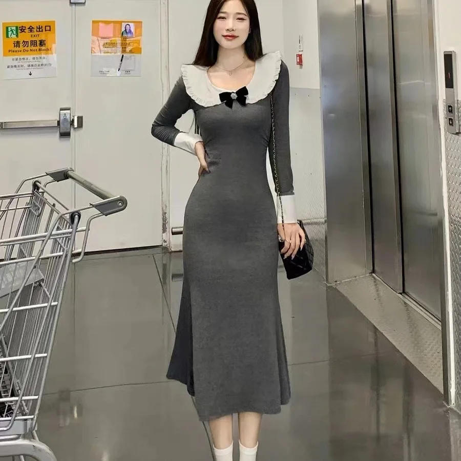 【New style】French long-sleeved gray doll-neck dress, women's slim design, niche hip wrap long dress
【New style】French long-sleeved gray doll-neck dress, women's slim design, niche hip wrap long dress