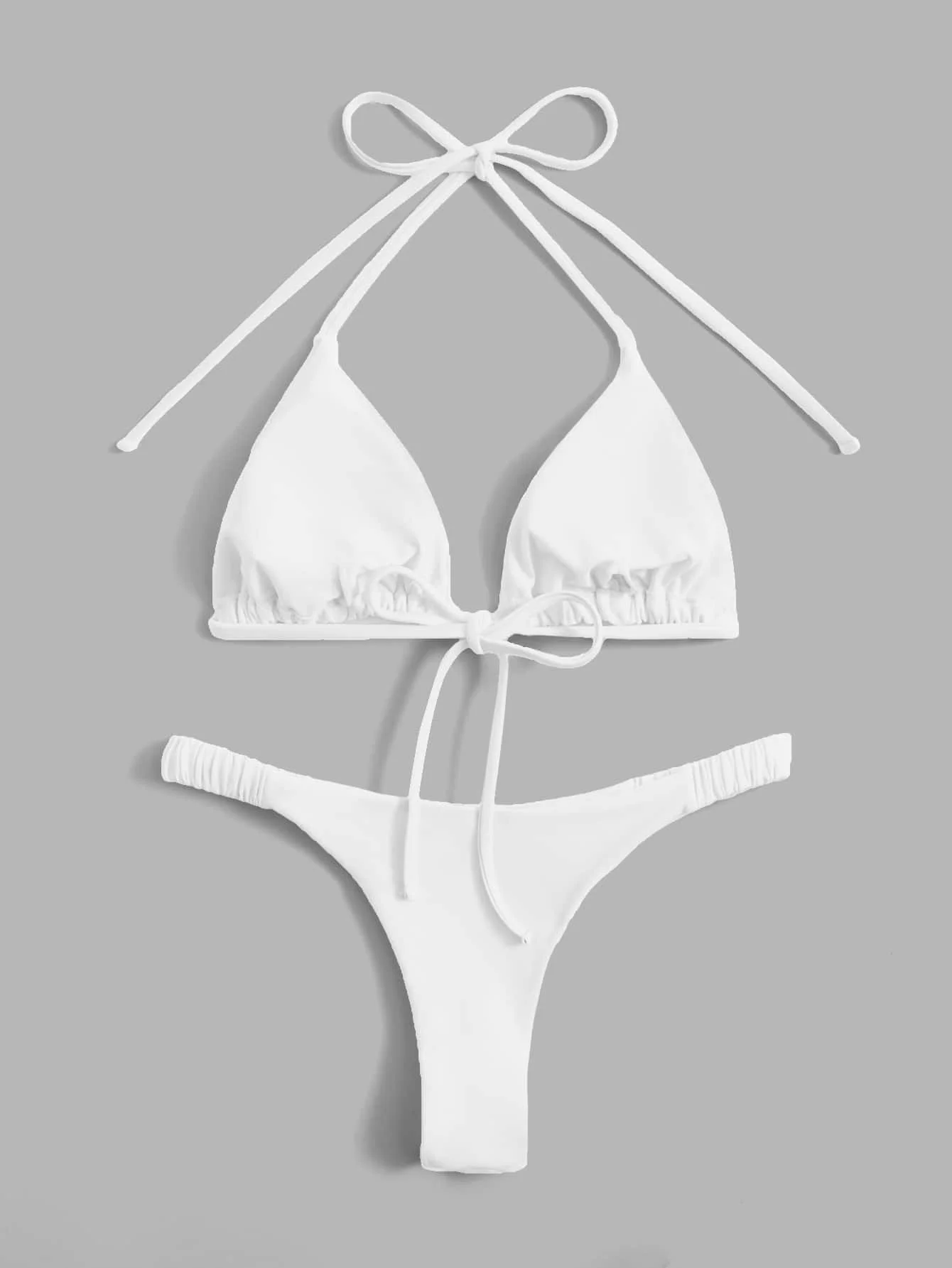 Solid White Halter Triangle Bikini Set With Tie Front Thong
Solid White Halter Triangle Bikini Set With Tie Front Thong