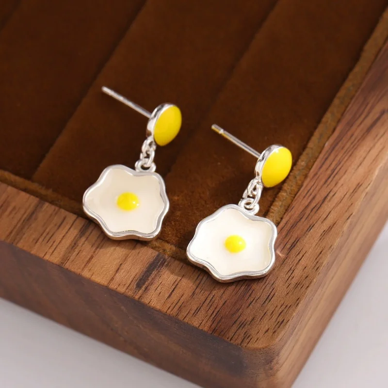 Uini Tail hot selling new 925 sterling silver sweet cartoon purse egg earrings fashionable and dynamic girl accessories ED147
Uini Tail hot selling new 925 sterling silver sweet cartoon purse egg earrings fashionable and dynamic girl accessories ED147