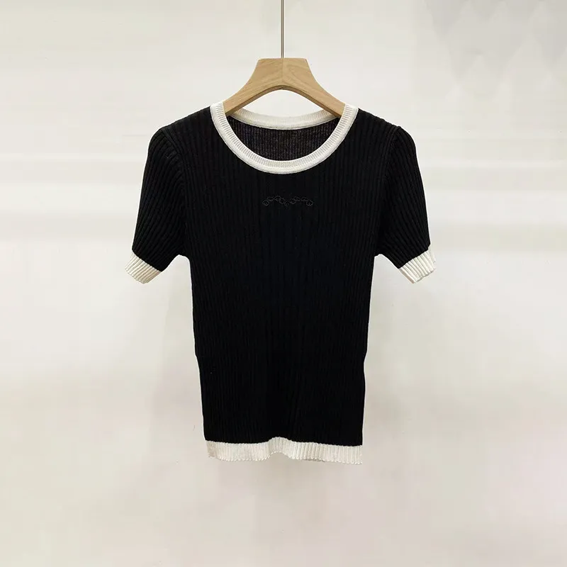 2026 Spring Hollow Out Embroidery Knitted Top Women Short Sleeve Round Neck Slim Fit Color Block Sweater
2026 Spring Hollow Out Embroidery Knitted Top Women Short Sleeve Round Neck Slim Fit Color Block Sweater