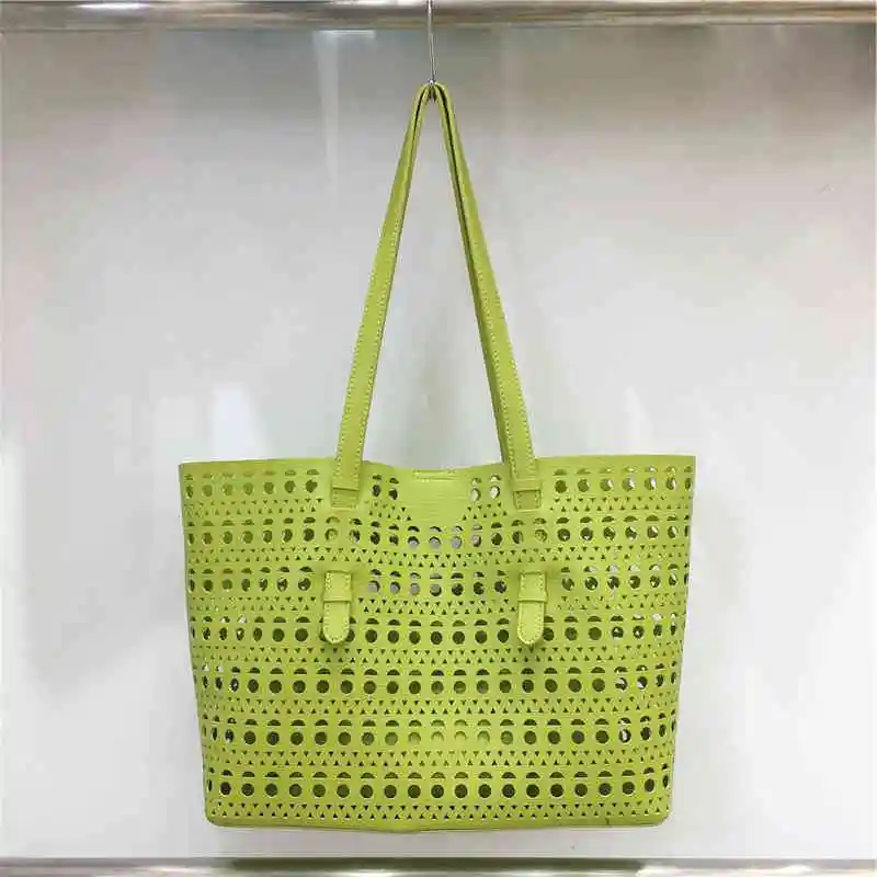Spring Summer Hollow Out Tote Bags for Women High-Grade Sense PU Leather Shoulder Composite Bag Lady Beach Handbags
Spring Summer Hollow Out Tote Bags for Women High-Grade Sense PU Leather Shoulder Composite Bag Lady Beach Handbags