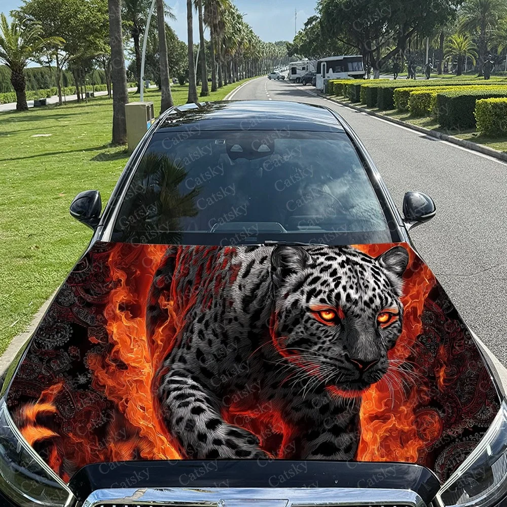This striking car hood wrap features a fierce leopard with fiery red eyes, surrounded by vibrant flames and intricate patterns.
This striking car hood wrap features a fierce leopard with fiery red eyes, surrounded by vibrant flames and intricate patterns.
