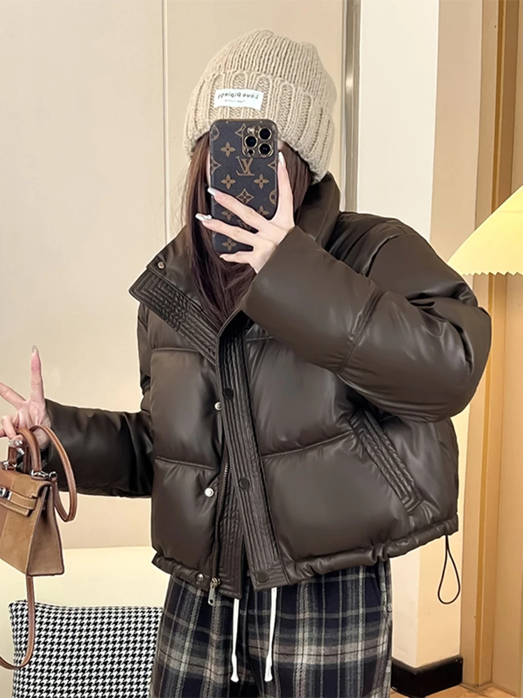 Женская зимняя утепленная куртка из искусственной кожи с хлопковой подкладкой, свободного кроя, модная, теплая, в корейском стиле, с длинными рукавами
Женская зимняя утепленная куртка из искусственной кожи с хлопковой подкладкой, свободного кроя, модная, теплая, в корейском стиле, с длинными рукавами