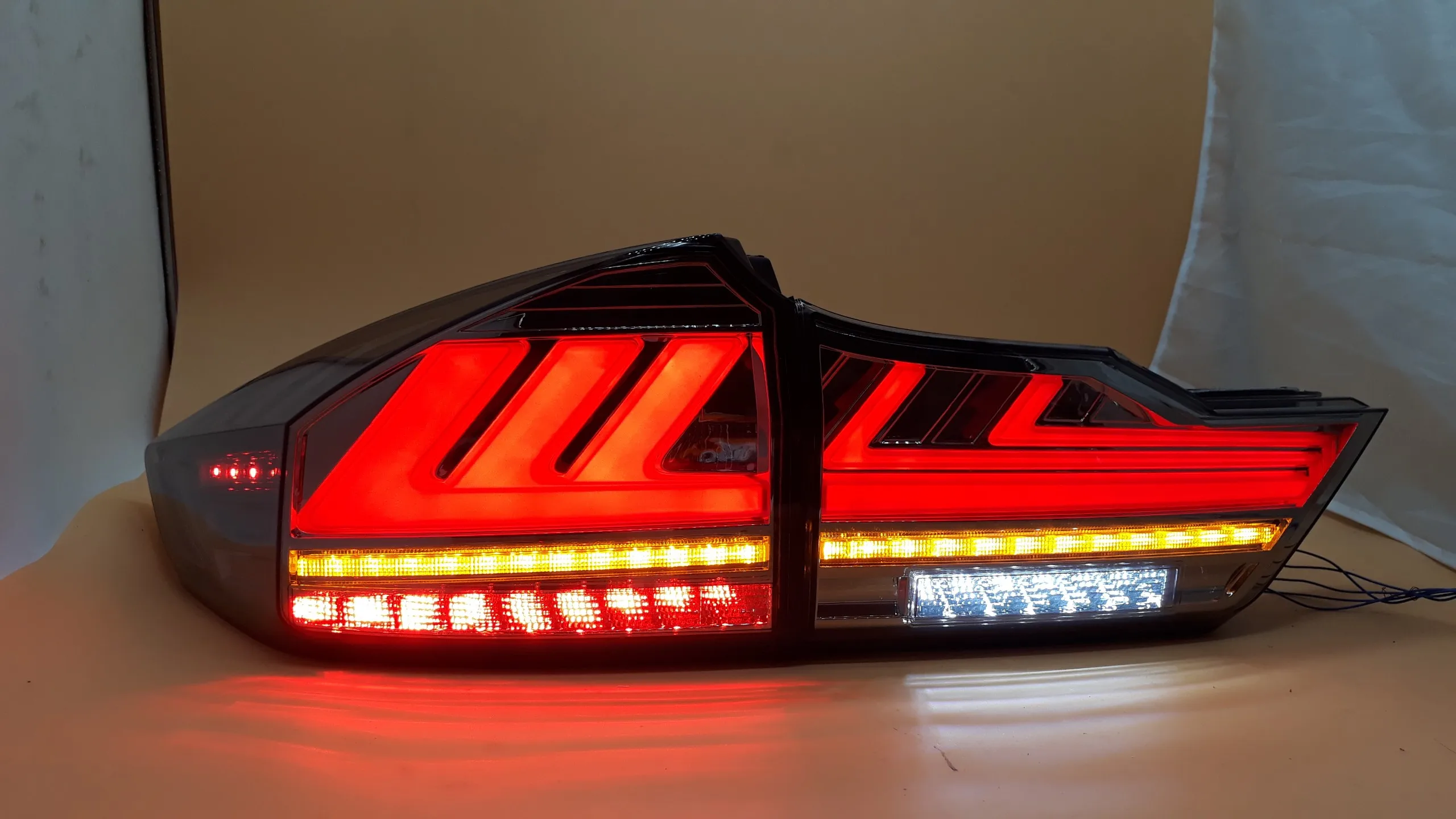 Honda City Newly Modified LED Tail Lamp Rear Back Lights New Lexus Design with Dynamic Signal Red and Smoke Colors
Honda City Newly Modified LED Tail Lamp Rear Back Lights New Lexus Design with Dynamic Signal Red and Smoke Colors