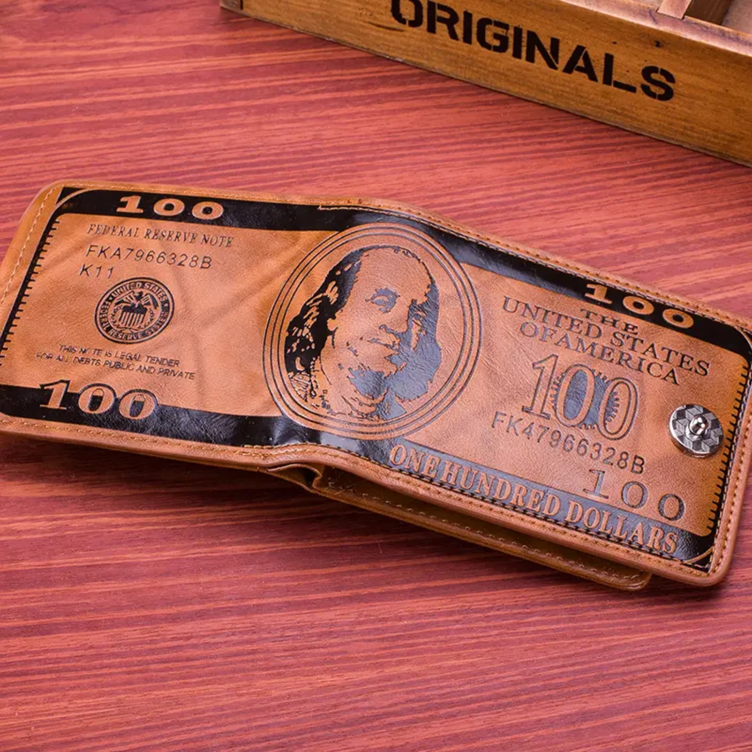 Stylish, Sleek Men's Short PU Leather Wallet with Classic Hundred Dollar Pattern and Secure Magnetic Buckle for Closure.
Stylish, Sleek Men's Short PU Leather Wallet with Classic Hundred Dollar Pattern and Secure Magnetic Buckle for Closure.