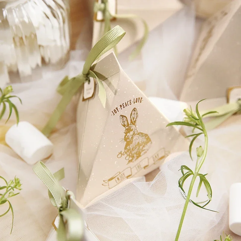 New Triangle Candy Box Text "joy Peace Love" Gift Box Invitation Card Gifts Bags Birthday Cartoon Rabbit Wedding Party Favors
New Triangle Candy Box Text "joy Peace Love" Gift Box Invitation Card Gifts Bags Birthday Cartoon Rabbit Wedding Party Favors