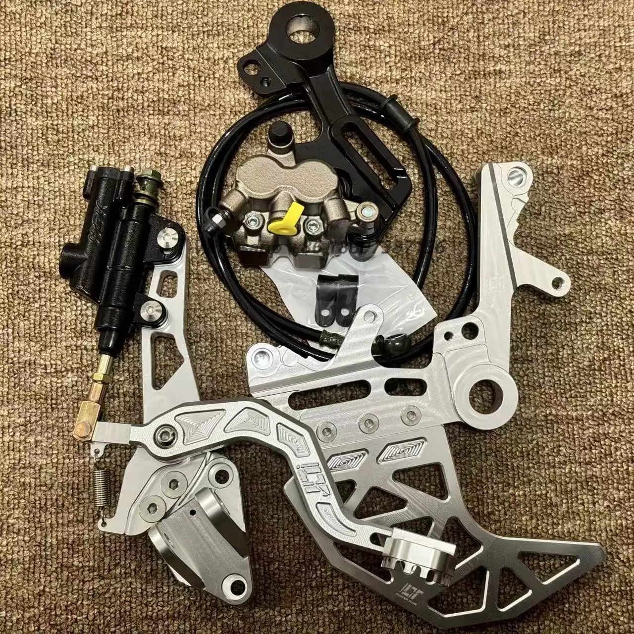 CNC Part Strengthened Surron Ultra Bee Left Dual Caliper Bracket and Silver Foot Pegs Motorcycle Accessories
CNC Part Strengthened Surron Ultra Bee Left Dual Caliper Bracket and Silver Foot Pegs Motorcycle Accessories