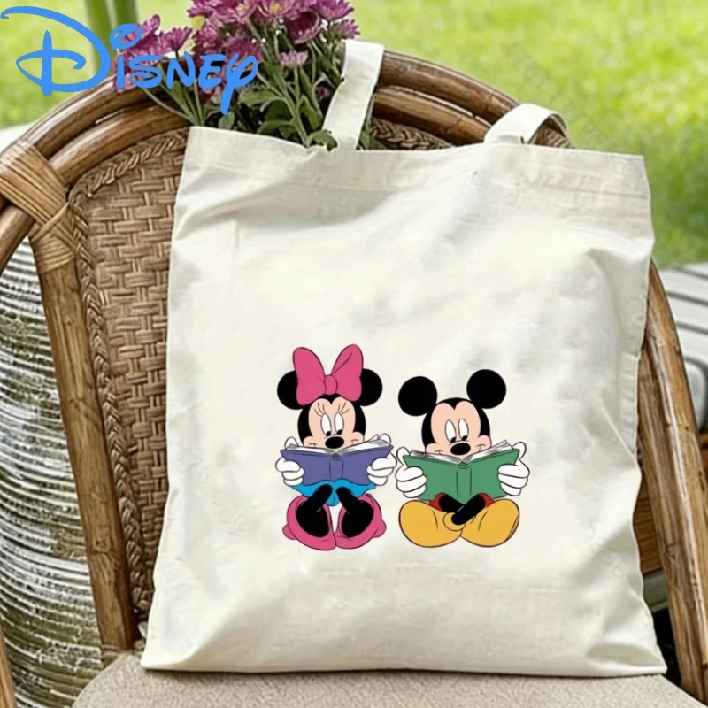 1PC Disney Mickey Minnie Reading Books Together Print Canvas Tote Bag Eco Shopping Casual Shoulder Handbag
1PC Disney Mickey Minnie Reading Books Together Print Canvas Tote Bag Eco Shopping Casual Shoulder Handbag