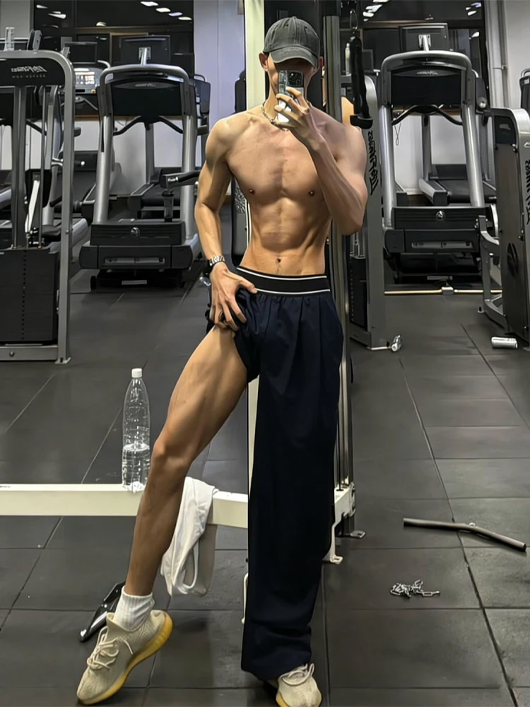 American Style Cool Feeling Ice Silk Wide Leg Sports Pants Men's Spring Summer Thin High Sensation Quick Dry Slimming Long Pants
American Style Cool Feeling Ice Silk Wide Leg Sports Pants Men's Spring Summer Thin High Sensation Quick Dry Slimming Long Pants