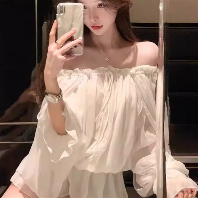 Белая шифоновая блузка с вырезом-лодочкой и открытыми плечами, без бретелек, с длинными расклешенными рукавами, свободного кроя, в балетном стиле, новинка Весна 2026
Белая шифоновая блузка с вырезом-лодочкой и открытыми плечами, без бретелек, с длинными расклешенными рукавами, свободного кроя, в балетном стиле, новинка Весна 2026