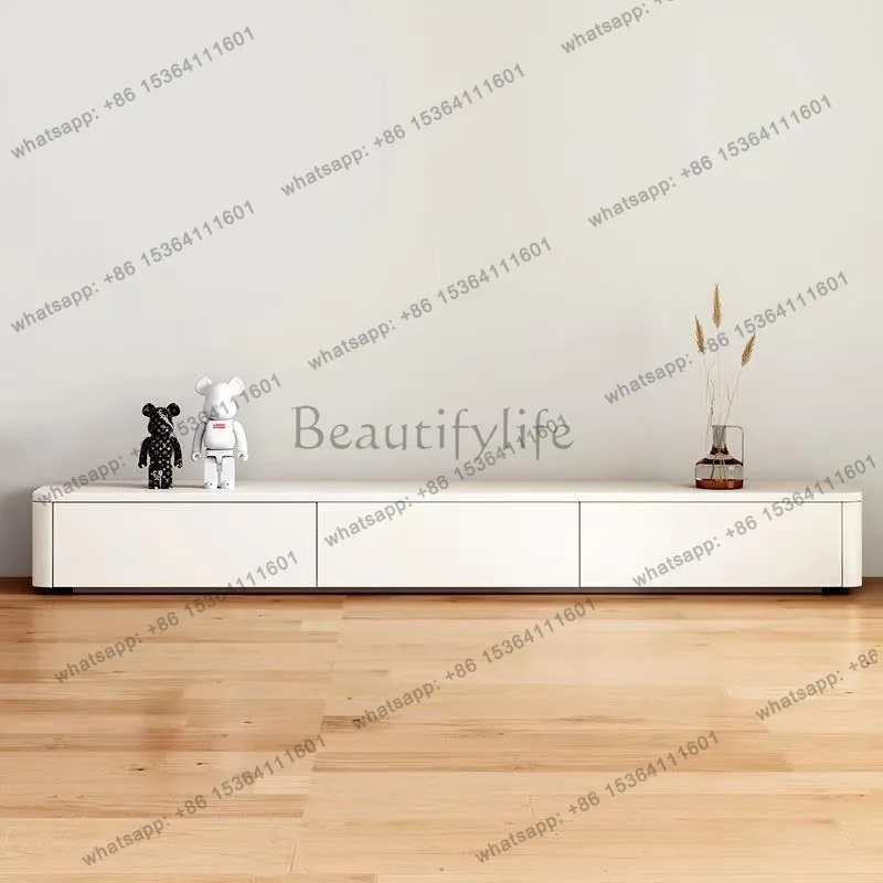 Минималистичная роскошная тумба под телевизор белого цвета с простым дизайном и уникальным элегантным стилем.
Минималистичная роскошная тумба под телевизор белого цвета с простым дизайном и уникальным элегантным стилем.