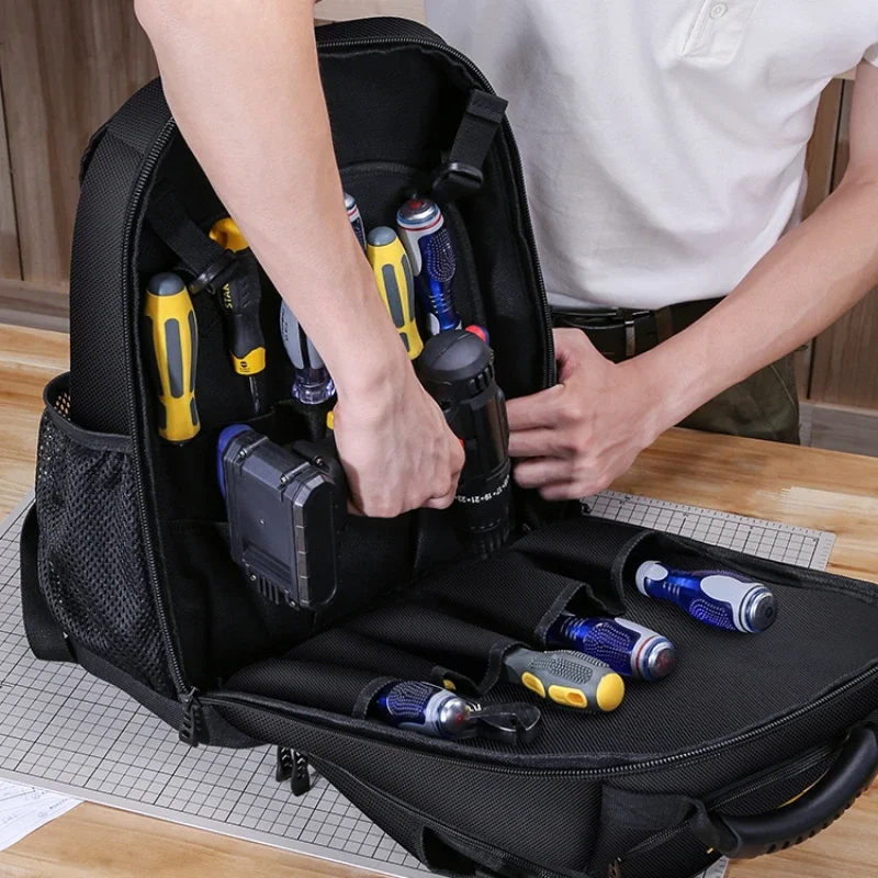 Computer tool backpack durable portable shoulder maintenance male electrician special storage book multifunctional waterproof.
Computer tool backpack durable portable shoulder maintenance male electrician special storage book multifunctional waterproof.